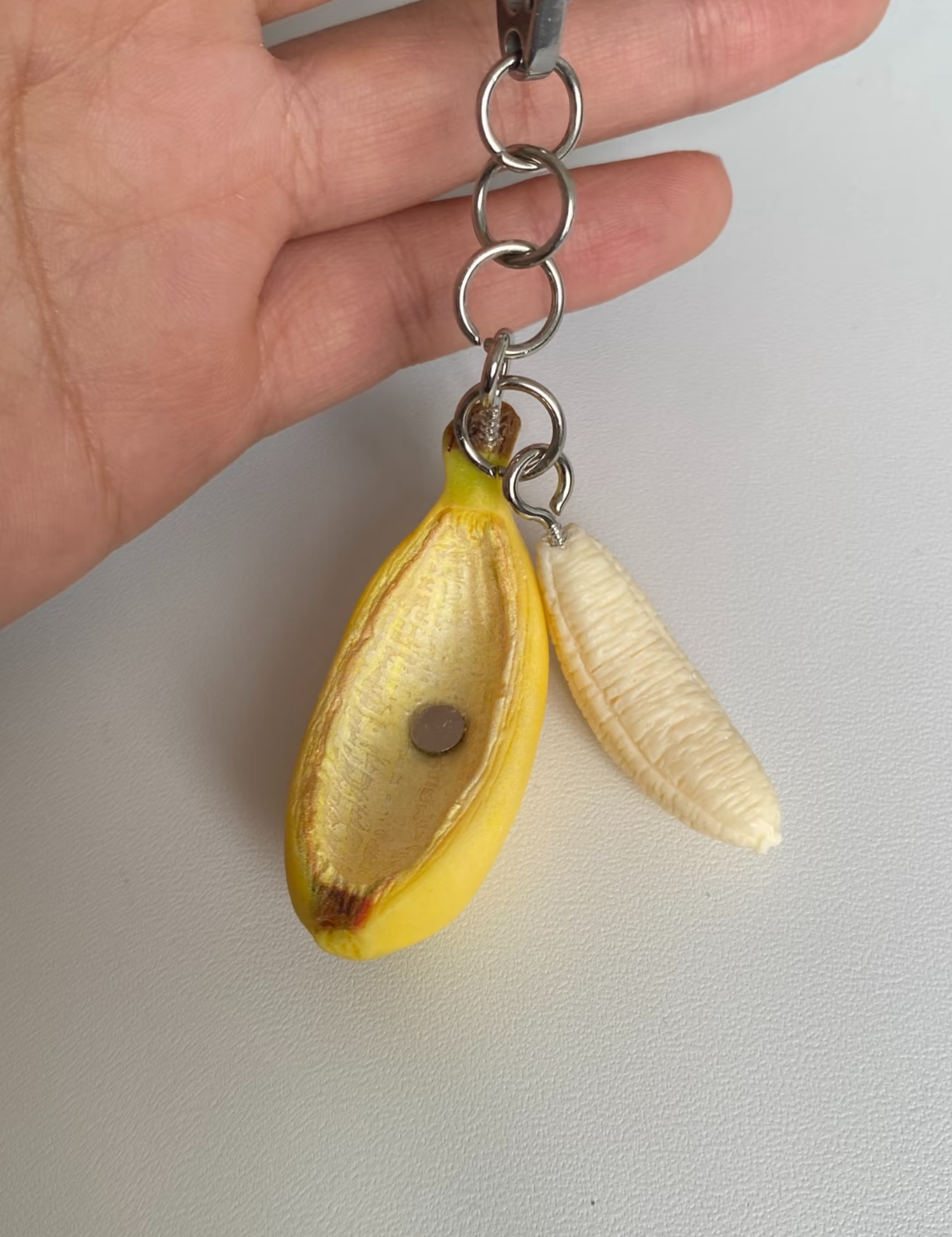 Realistic peelable banana fruit charm ornament - a unique gift from Asia, sold at Salt.a.Peper gift shop